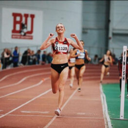 Vanessa crossing the finish line