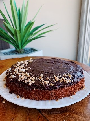 Dairy-free, gluten-free chocolate chip birthday cake with peanut butter-chocolate frosting.
