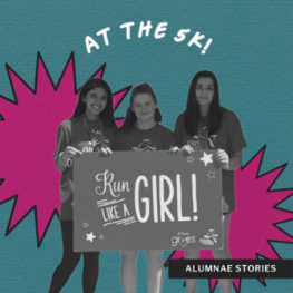 Three GOTR girls hold up a sign that reads, "Run like a girl." These girls are now Girls on the Run alumnae, who symbolically are opening the door for future GOTR girls.