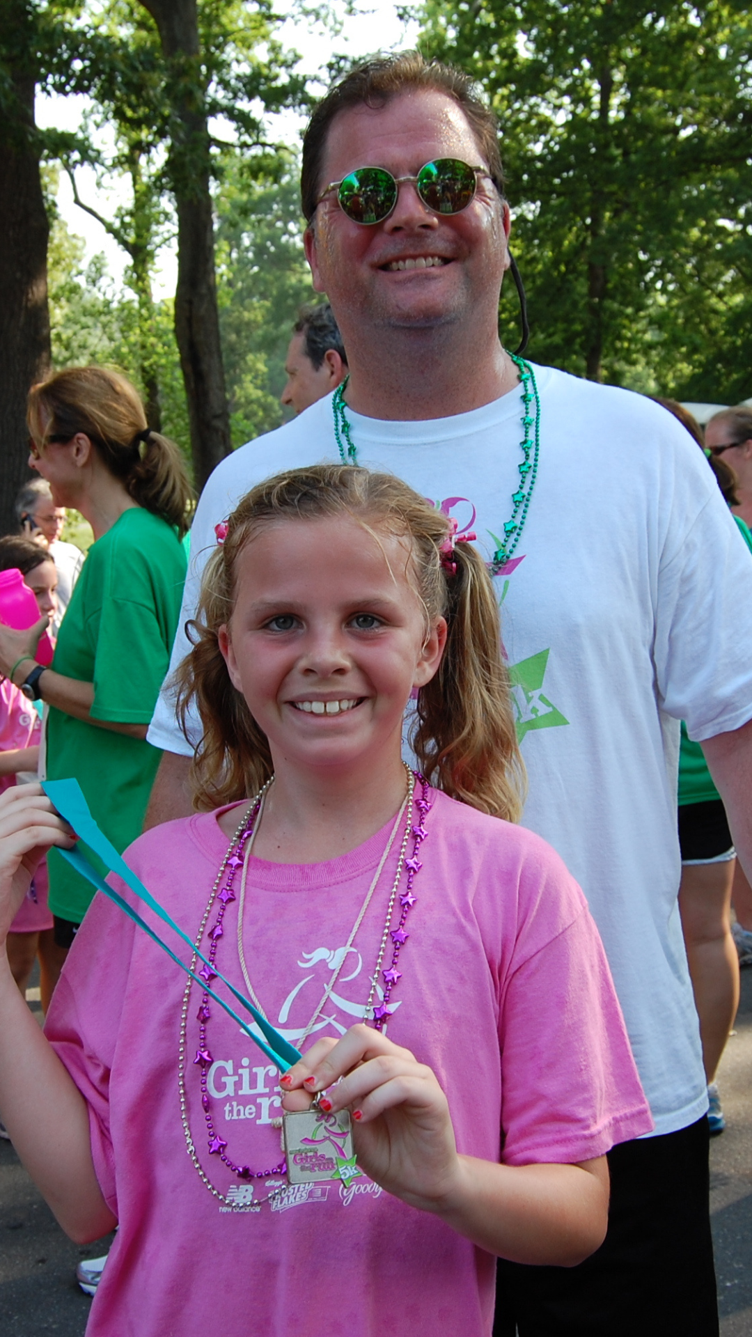 GOTR Dad at 5K with daughter wearing a GOTR shirt